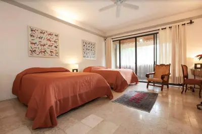 Cama o camas de una habitación en Orchidelirium Casa Hotel & Salud Estética