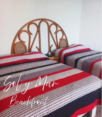 Cama o camas de una habitación en Torres Gemelas Acapulco Suites