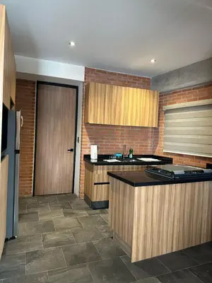 Una cocina o zona de cocina en Departamento 102 torre arcati