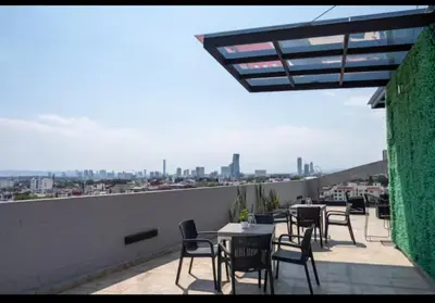 Un balcón o terraza de Departamento 102 torre arcati