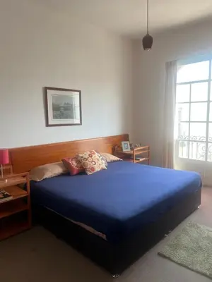 Cama o camas de una habitación en Puebla en familia