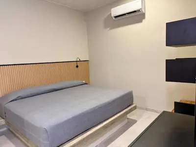 Cama o camas de una habitación en Rooms Sector M