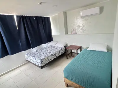 Cama o camas de una habitación en Hotel Sicarú