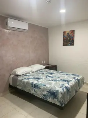 Cama o camas de una habitación en Hotel Sicarú