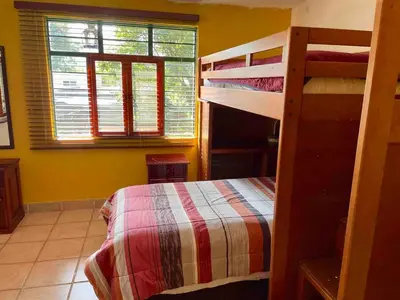 Cama o camas de una habitación en Casa familiar céntrica y con bella vista