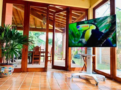 Una televisión o centro de entretenimiento en Casa familiar céntrica y con bella vista