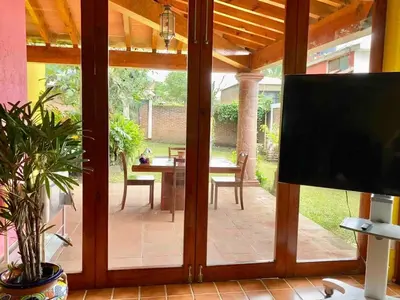 Una televisión o centro de entretenimiento en Casa familiar céntrica y con bella vista