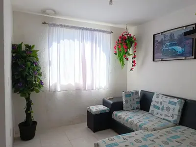 Zona de estar de Casa en club náutico Tequesquitengo
