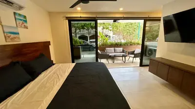 Zona de estar de Stay just steps away from the beach!