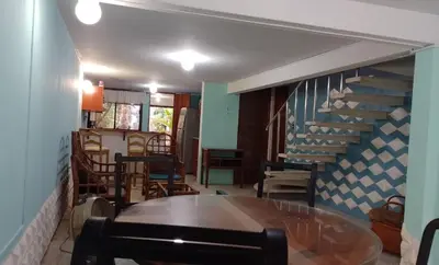 Zona de estar de Acogedora casita en la playa