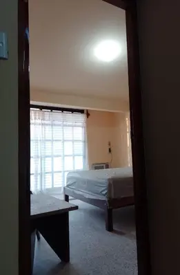 Cama o camas de una habitación en Acogedora casita en la playa