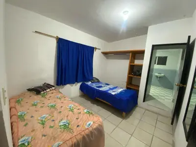 Cama o camas de una habitación en Amplio departamento a 7 minutos de cholula