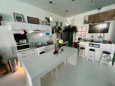 Una cocina o zona de cocina en Casa loft con alberca