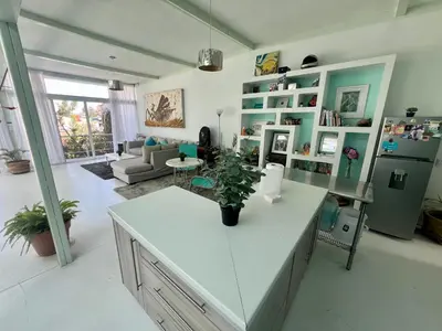 Una cocina o zona de cocina en Casa loft con alberca