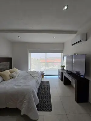 Cama o camas de una habitación en Descanso en ACAPULCO DIAMANTE