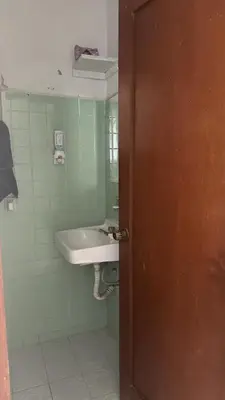 Un baño de Departamento flores Magón