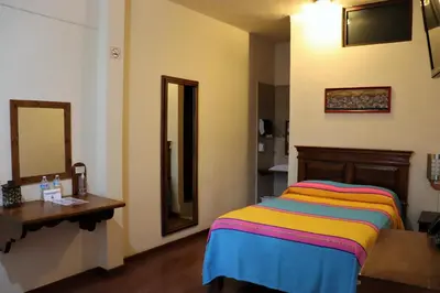 Cama o camas de una habitación en Hotel Zaragoza