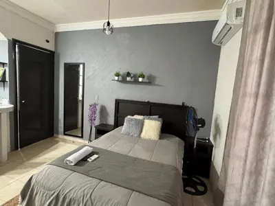 Cama o camas de una habitación en Casa Kate Juchitán