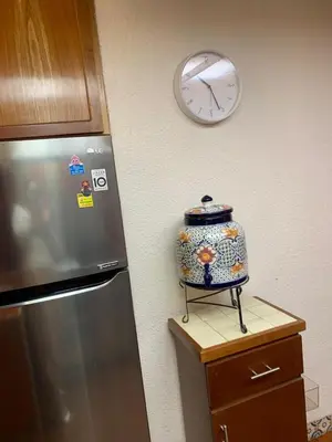 Una cocina o zona de cocina en Acogedor departamento