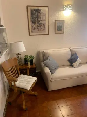 Zona de estar de Acogedor departamento