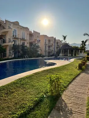 Piscina en o cerca de Depto en Planta Baja con Alberca, WiFi Rápido y Smart TV