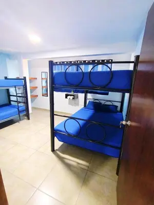 Cama o camas de una habitación en Neza Esperanza
