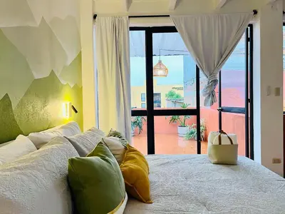 Cama o camas de una habitación en XochiHouse