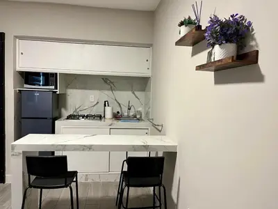 Una cocina o zona de cocina en Depa Equipado Zona de Estadios & Restaurantes