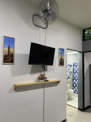 Una televisión o centro de entretenimiento en Casa Alameda