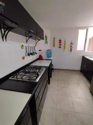 Una cocina o zona de cocina en Hospedaje Casa Azul