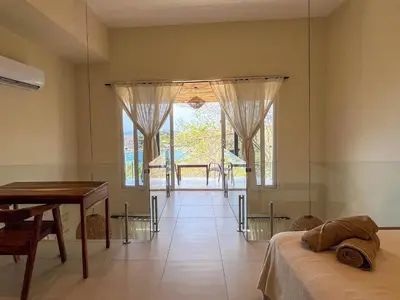 Cama o camas de una habitación en Estrella de Mar Suites
