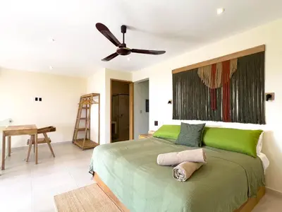 Cama o camas de una habitación en Estrella de Mar Suites