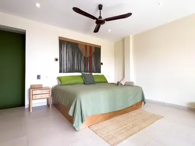Cama o camas de una habitación en Estrella de Mar Suites