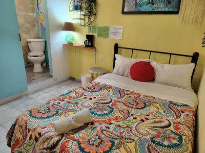 Cama o camas de una habitación en Ganesha HOSTAL
