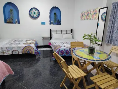 Cama o camas de una habitación en Ganesha HOSTAL