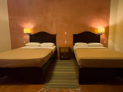 Cama o camas de una habitación en La Cupula B&B Teotitlan