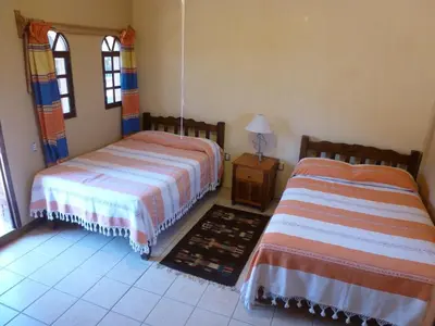 Cama o camas de una habitación en La Cupula B&B Teotitlan