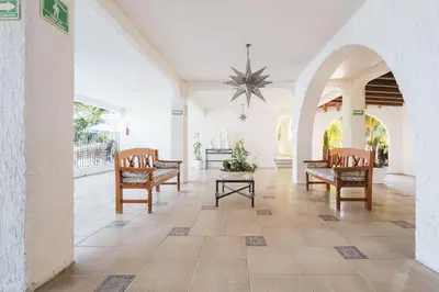 Zona de estar de Comoda Habitacion en Hotel con Vista al Lago, Tequesquitengo