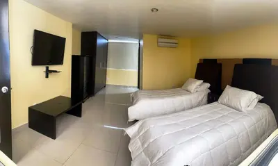Cama o camas de una habitación en Casa Lomas de Cuernavaca