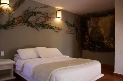 Cama o camas de una habitación en Hotel Mythos