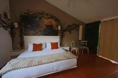 Cama o camas de una habitación en Hotel Mythos