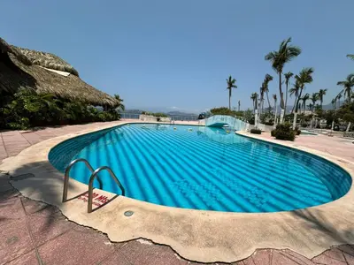 Piscina en o cerca de Departamento a orilla de playa