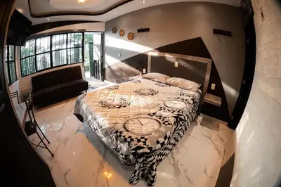 Cama o camas de una habitación en Habitación Verde Amanecer
