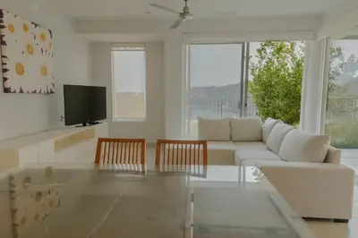 Una televisión o centro de entretenimiento en Condos Cruz del Mar