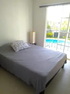 Cama o camas de una habitación en Casa con jardín y piscina ideal para el fin de semana