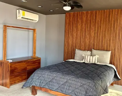 Cama o camas de una habitación en Modern loft with AC Close to downtown Huatulco