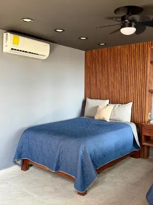 Cama o camas de una habitación en Modern loft with AC Close to downtown Huatulco