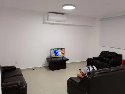 Una televisión o centro de entretenimiento en Playa, amplitud y tranquilidad