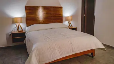 Cama o camas de una habitación en Hotel Entre Volcanes