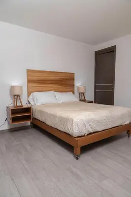 Cama o camas de una habitación en Hotel Entre Volcanes